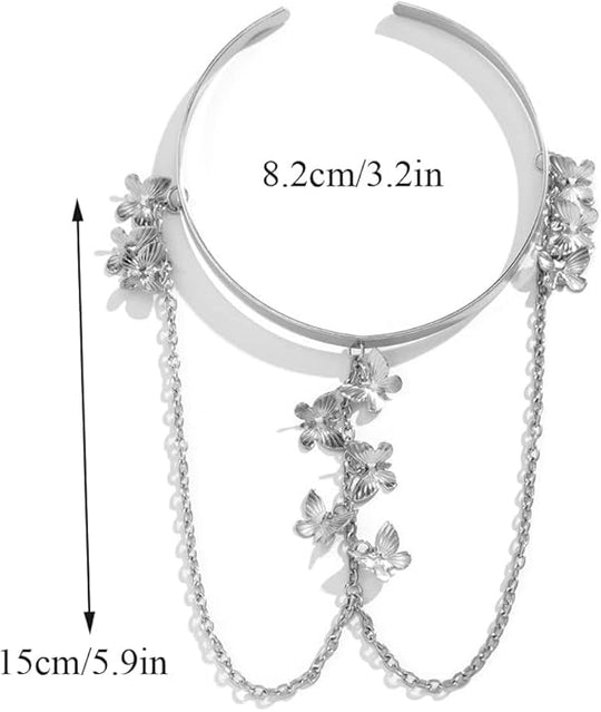 Silver arm cuff with butterfly designs and measurement details on a white background