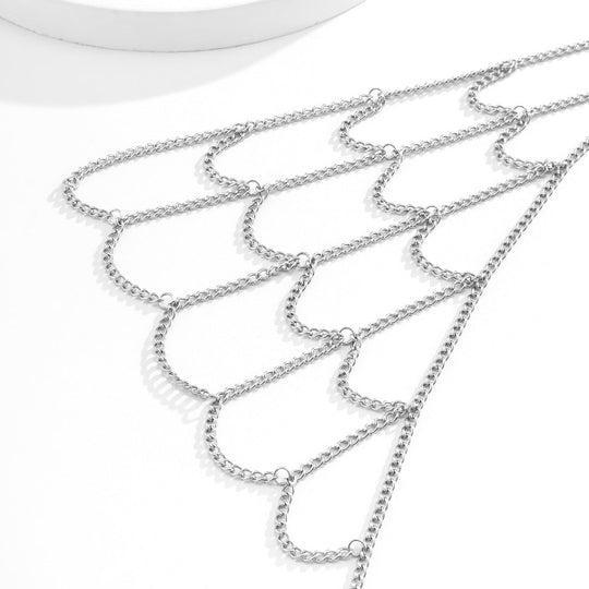 Silver chain necklace on a white background